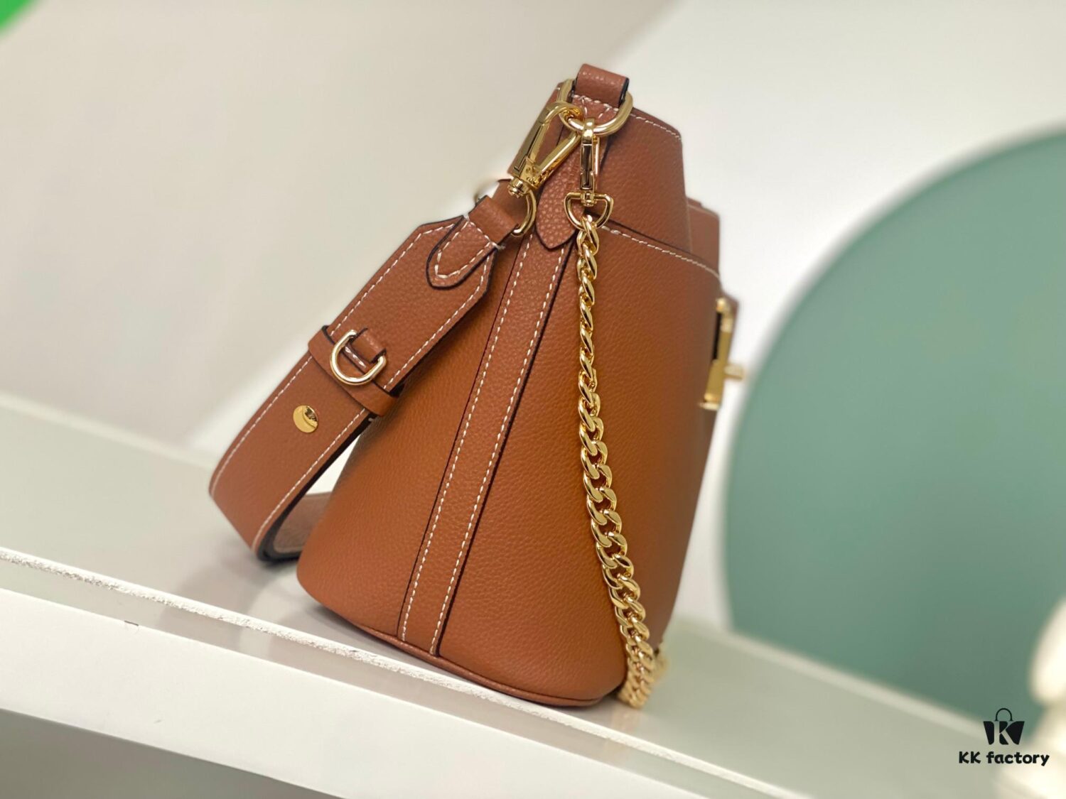 693088326e68136f4d9a88ba Haiyuan Export Genuine Leather Bucket Bag Chain Bag Series Lock and Walk Handbag M24006 Black M24638 White M24165 Brown