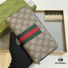 69308e926e68136f4d9a953a Gucci GG Supreme Canvas Full-Zip Wallet with Web Stripe