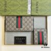 69308e936e68136f4d9a953c Gucci GG Supreme Canvas Full-Zip Wallet with Web Stripe
