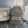 693092ff6e68136f4d9a9dab Embroidered Large Upgrade Backpack Dior 2020 Pre-Spring New Arrival 💥 Oblique Canvas and Black Grained-Touch Calfskin Backpack, Dior Signature Detail, Quilted Tech Mesh Back Panel and 3D 'CD' Logo 🌟 Black Calfskin Trim, Black Quilted Nylon Adjustable Strap ♻️ Dual Function: Shoulder Carry and Handheld