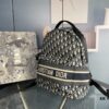 693092ff6e68136f4d9a9dac Embroidered Large Upgrade Backpack Dior 2020 Pre-Spring New Arrival 💥 Oblique Canvas and Black Grained-Touch Calfskin Backpack, Dior Signature Detail, Quilted Tech Mesh Back Panel and 3D 'CD' Logo 🌟 Black Calfskin Trim, Black Quilted Nylon Adjustable Strap ♻️ Dual Function: Shoulder Carry and Handheld