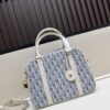 693094426e68136f4d9a9ff9 Large D-Vibe Bowling Bag in Blue Oblique Print