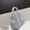 693094436e68136f4d9a9ffa Large D-Vibe Bowling Bag in Blue Oblique Print