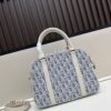 693094466e68136f4d9a9ffe Large D-Vibe Bowling Bag in Blue Oblique Print