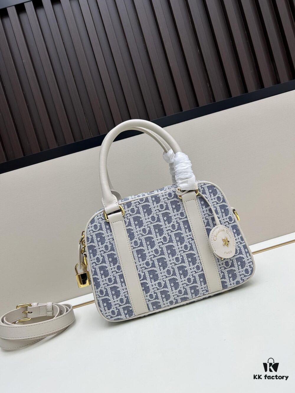693094476e68136f4d9aa001 Small D-Vibe Bowling Bag in Blue Oblique Print