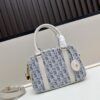 693094476e68136f4d9aa001 Small D-Vibe Bowling Bag in Blue Oblique Print