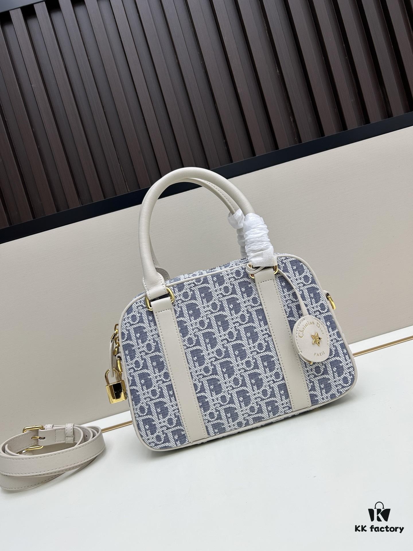 693094476e68136f4d9aa001 Small D-Vibe Bowling Bag in Blue Oblique Print