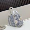 693094486e68136f4d9aa003 Small D-Vibe Bowling Bag in Blue Oblique Print