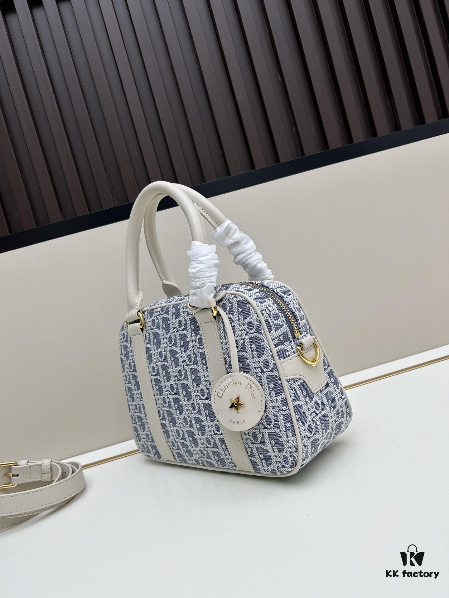 693094486e68136f4d9aa003 Small D-Vibe Bowling Bag in Blue Oblique Print