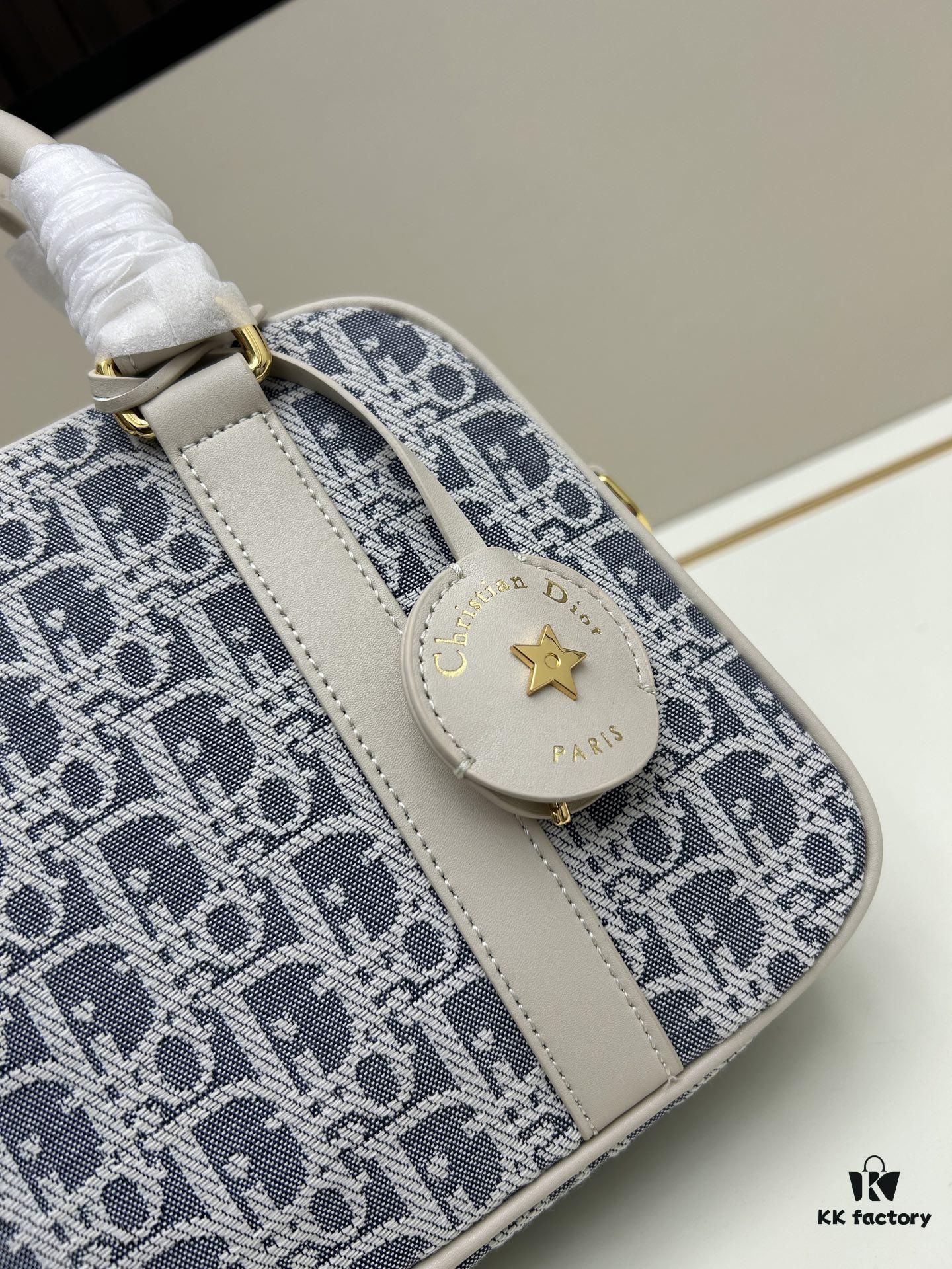 6930944a6e68136f4d9aa005 Small D-Vibe Bowling Bag in Blue Oblique Print