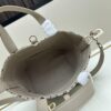 6930948f6e68136f4d9aa07e Dior Toujours Vertical Top Handle Bag in Blush Beige Calfskin with Cannage Stitching
