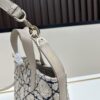 6930948f6e68136f4d9aa07f Dior Toujours Vertical Top Handle Bag in Blush Beige Calfskin with Cannage Stitching