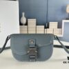 6930954a6e68136f4d9aa1f0 Dior Saddle Clutch with Shoulder Strap in Oblique Print Fabric and Black Grained Calfskin