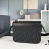 Box Included [Top Original Version] This mini saddle messenger bag is exquisitely fashionable, crafted from black grained cowhide leather with a flap closure and 'DIOR' signature, highlighting the refined charm of the saddle design. Spacious interior compartments with a patch pocket to store daily essentials. Equipped with an adjustable leather shoulder strap for shoulder or crossbody wear.