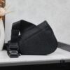 693095a46e68136f4d9aa2a3 This boxed saddle bag is a new piece from the classic collection, crafted in black grained calfskin leather.