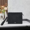 693095a86e68136f4d9aa2a7 Dior Envelope Clutch with Box ||| Crafted from premium calf leather, this Dior envelope clutch draws inspiration from the brand's archives, featuring a signature Dior logo plaque on the front for elevated sophistication. Spacious zip compartment fits most smartphones, complemented by six card slots. Includes a detachable grained calfskin wrist strap with lobster clasp for versatile carrying options—either handheld or tucked into a larger handbag.