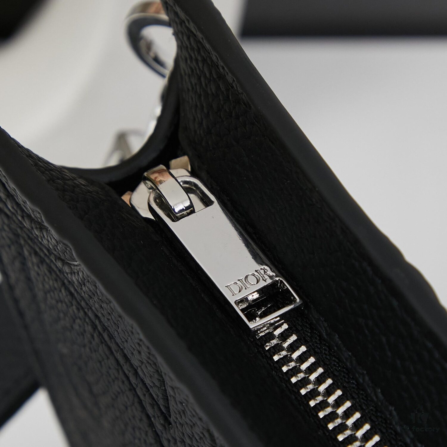 693095ab6e68136f4d9aa2b1 Dior Envelope Clutch with Box ||| Crafted from premium calf leather, this Dior envelope clutch draws inspiration from the brand's archives, featuring a signature Dior logo plaque on the front for elevated sophistication. Spacious zip compartment fits most smartphones, complemented by six card slots. Includes a detachable grained calfskin wrist strap with lobster clasp for versatile carrying options—either handheld or tucked into a larger handbag.
