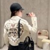 693095c16e68136f4d9aa2df Dior Toujours Medium Vertical Handbag in Blush Beige Calfskin with Cannage Stitching