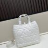 693095c56e68136f4d9aa2e8 Dior Toujours Vertical Handbag in Blush Beige Calfskin with Cannage Stitching