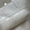 693095c96e68136f4d9aa2ed Dior Toujours Vertical Handbag in Blush Beige Calfskin with Cannage Stitching