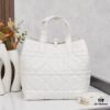 693096036e68136f4d9aa35f Dior Toujours Medium Vertical Handbag in Blush Beige Calfskin with Oversized Cannage Stitching
