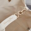 693096056e68136f4d9aa362 Dior Toujours Medium Vertical Handbag in Blush Beige Calfskin with Oversized Cannage Stitching