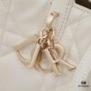 693096066e68136f4d9aa363 Dior Toujours Medium Vertical Handbag in Blush Beige Calfskin with Oversized Cannage Stitching