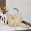 693096086e68136f4d9aa367 Dior Toujours Small Vertical Handbag in Black Calfskin with Cannage Stitching