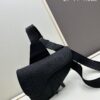 693097266e68136f4d9aa5e8 This boxed saddle bag is a new piece from the classic collection, meticulously crafted from black grained leather. A magnetic flap conceals a zip pocket for daily essentials, and it features an adjustable Christian Dior jacquard webbing strap for shoulder or crossbody wear.