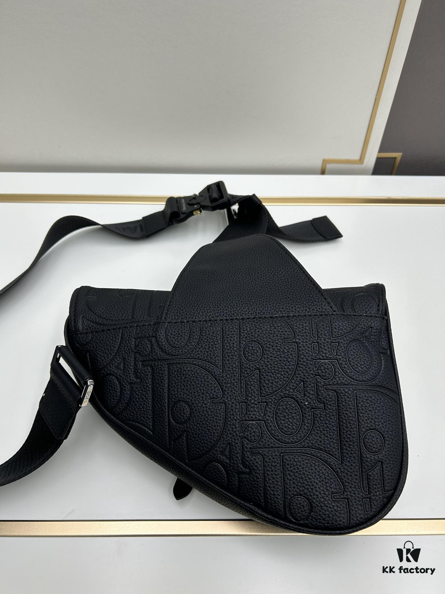 693097276e68136f4d9aa5ea This boxed saddle bag is a new piece from the classic collection, meticulously crafted from black grained leather. A magnetic flap conceals a zip pocket for daily essentials, and it features an adjustable Christian Dior jacquard webbing strap for shoulder or crossbody wear.