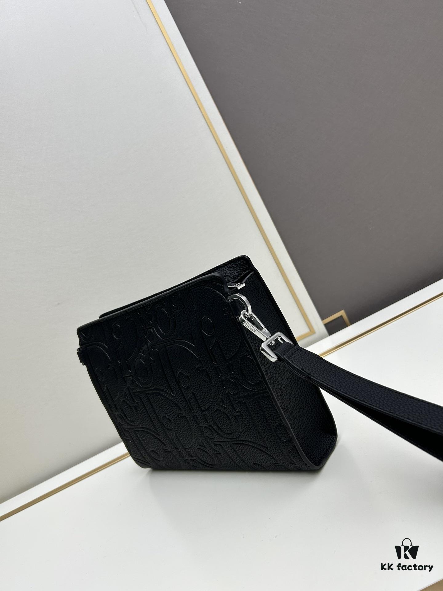 693097296e68136f4d9aa5f0 Dior Clutch with Box ||| This clutch is a signature piece from Dior, crafted meticulously from cowhide leather and inspired by the Dior archives. It features a prominent Dior logo on the front for elevated sophistication.