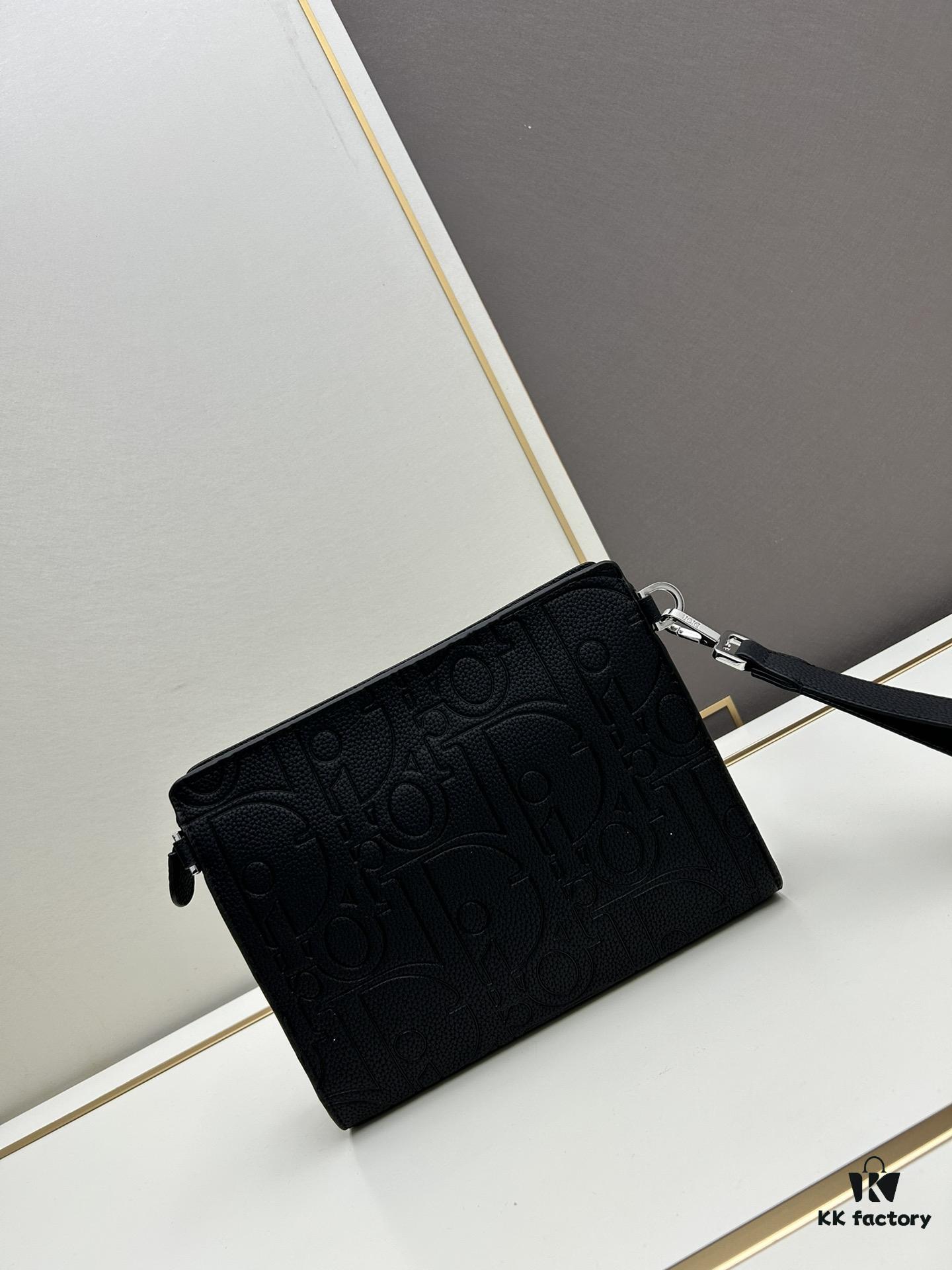 6930972a6e68136f4d9aa5f2 Dior Clutch with Box ||| This clutch is a signature piece from Dior, crafted meticulously from cowhide leather and inspired by the Dior archives. It features a prominent Dior logo on the front for elevated sophistication.