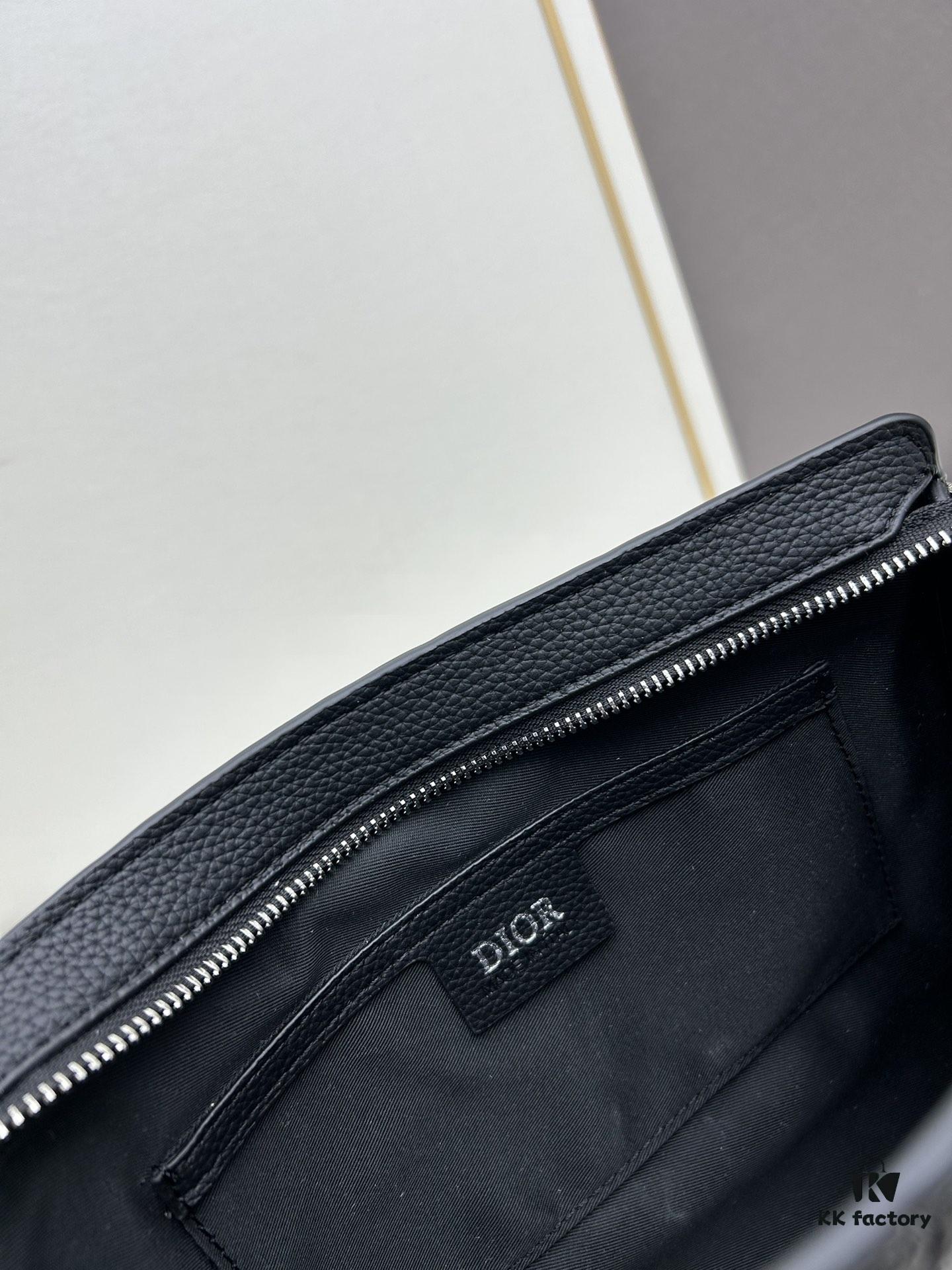 6930972e6e68136f4d9aa5f7 Dior Clutch with Box ||| This clutch is a signature piece from Dior, crafted meticulously from cowhide leather and inspired by the Dior archives. It features a prominent Dior logo on the front for elevated sophistication.