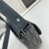 6930975c6e68136f4d9aa643 Dior Saddle Clutch with Shoulder Strap, Grainy Calfskin and Oblique Print, Black and Beige