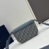 693097796e68136f4d9aa66c Dior Saddle Clutch with Shoulder Strap, Grainy Calfskin and Oblique Print, Black and Beige