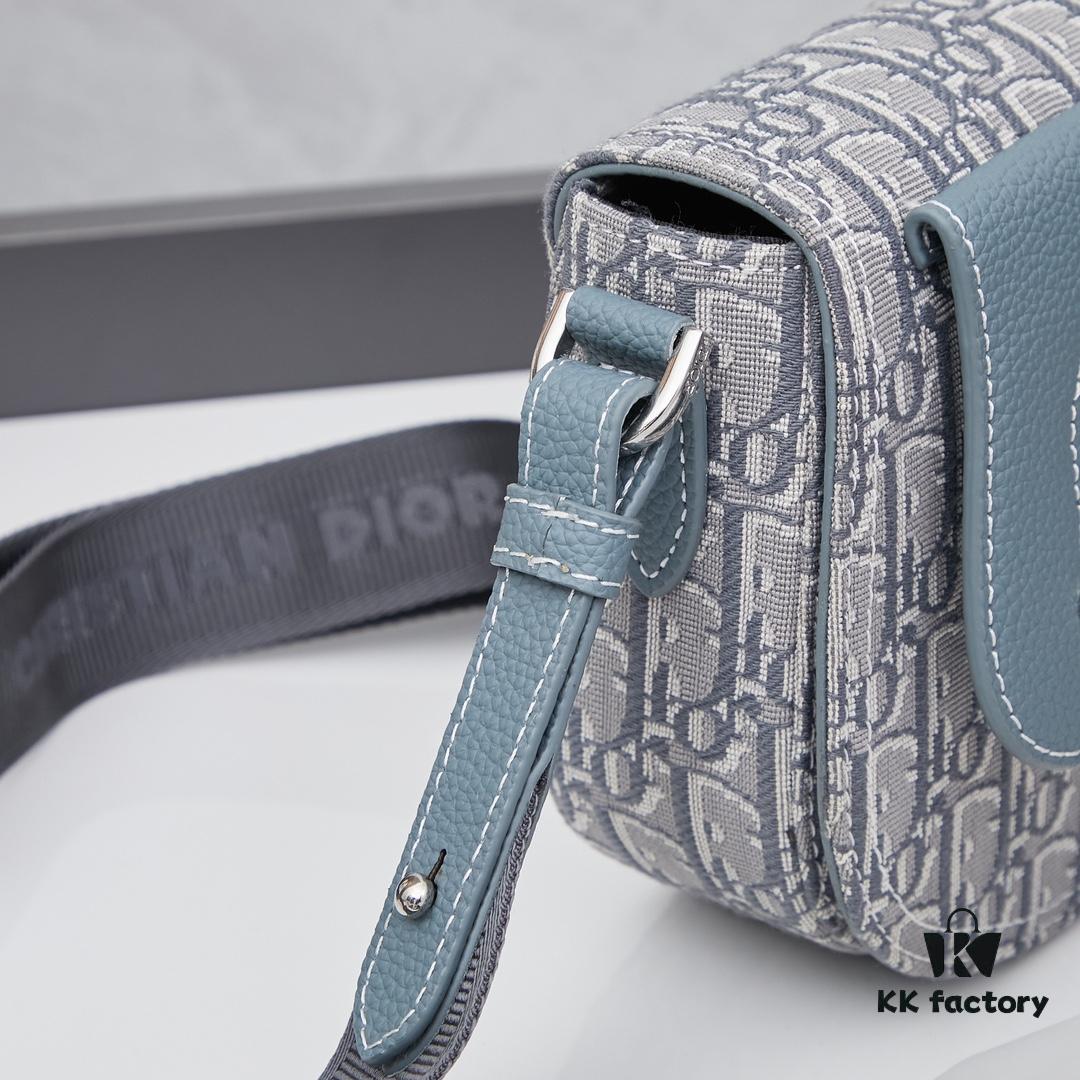 693098106e68136f4d9aa79d Saddle Messenger Bag with Box (Beige and Black Oblique Print Fabric with Black Grained Calfskin Trim)