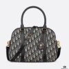 693098c76e68136f4d9aa904 Large D-Vibe Bowling Bag in Blue Oblique Print