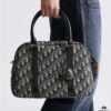 693098c86e68136f4d9aa906 Large D-Vibe Bowling Bag in Blue Oblique Print