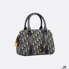 693098d26e68136f4d9aa918 Small D-Vibe Bowling Bag in Blue Oblique Print