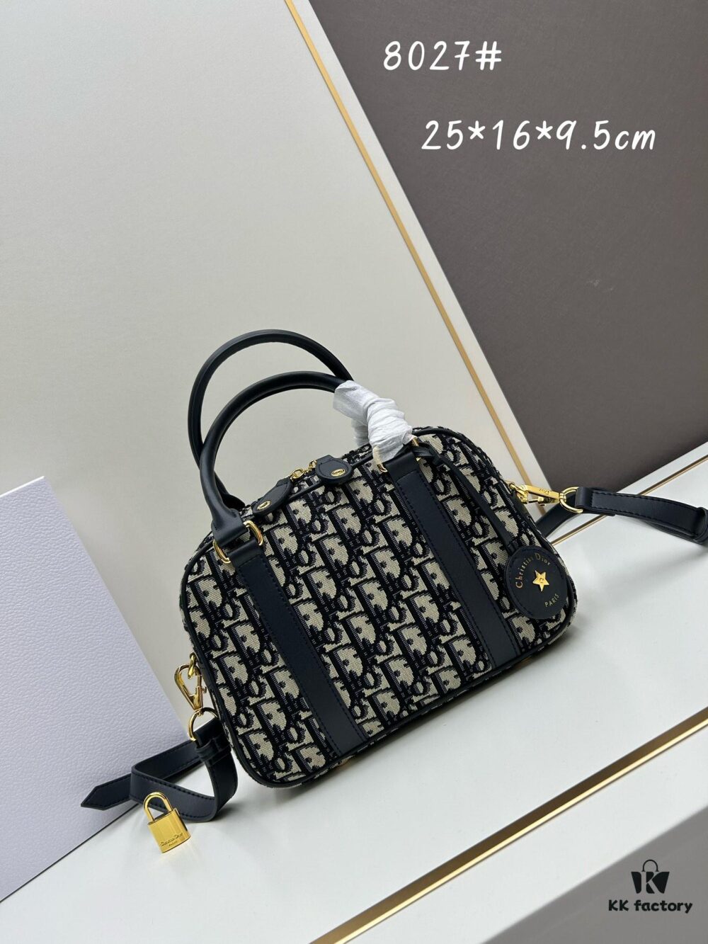 693098d46e68136f4d9aa91b Small D-Vibe Bowling Bag in Blue Oblique Print