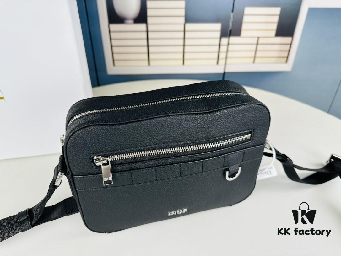 693099c06e68136f4d9aaae8 Safari Messenger Bag with Box This practical and compact messenger bag is ideal for daily use. Crafted from black Oblique printed fabric, it features details in black grained calf leather. Equipped with a zip compartment and a front pocket for everyday essentials, it comes with an adjustable Christian Dior shoulder strap for shoulder or crossbody wear.