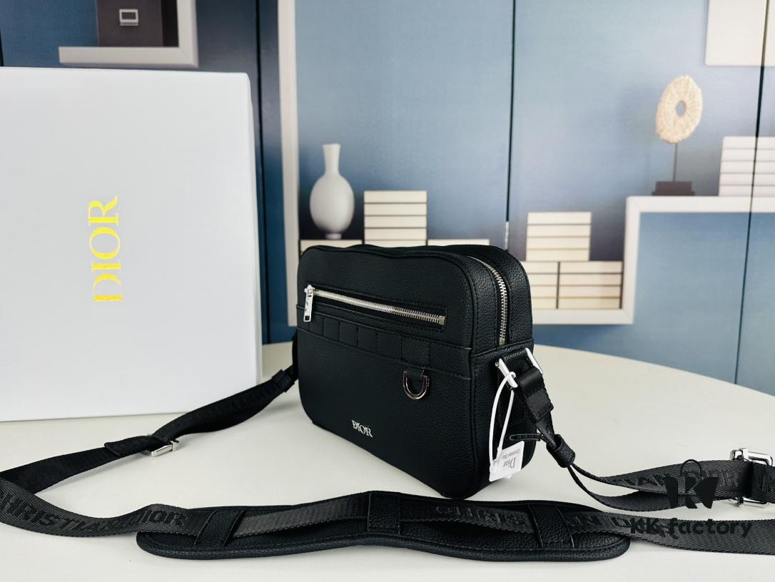 693099c06e68136f4d9aaaeb Safari Messenger Bag with Box This practical and compact messenger bag is ideal for daily use. Crafted from black Oblique printed fabric, it features details in black grained calf leather. Equipped with a zip compartment and a front pocket for everyday essentials, it comes with an adjustable Christian Dior shoulder strap for shoulder or crossbody wear.