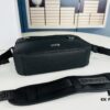 693099c26e68136f4d9aaaec Safari Messenger Bag with Box This practical and compact messenger bag is ideal for daily use. Crafted from black Oblique printed fabric, it features details in black grained calf leather. Equipped with a zip compartment and a front pocket for everyday essentials, it comes with an adjustable Christian Dior shoulder strap for shoulder or crossbody wear.