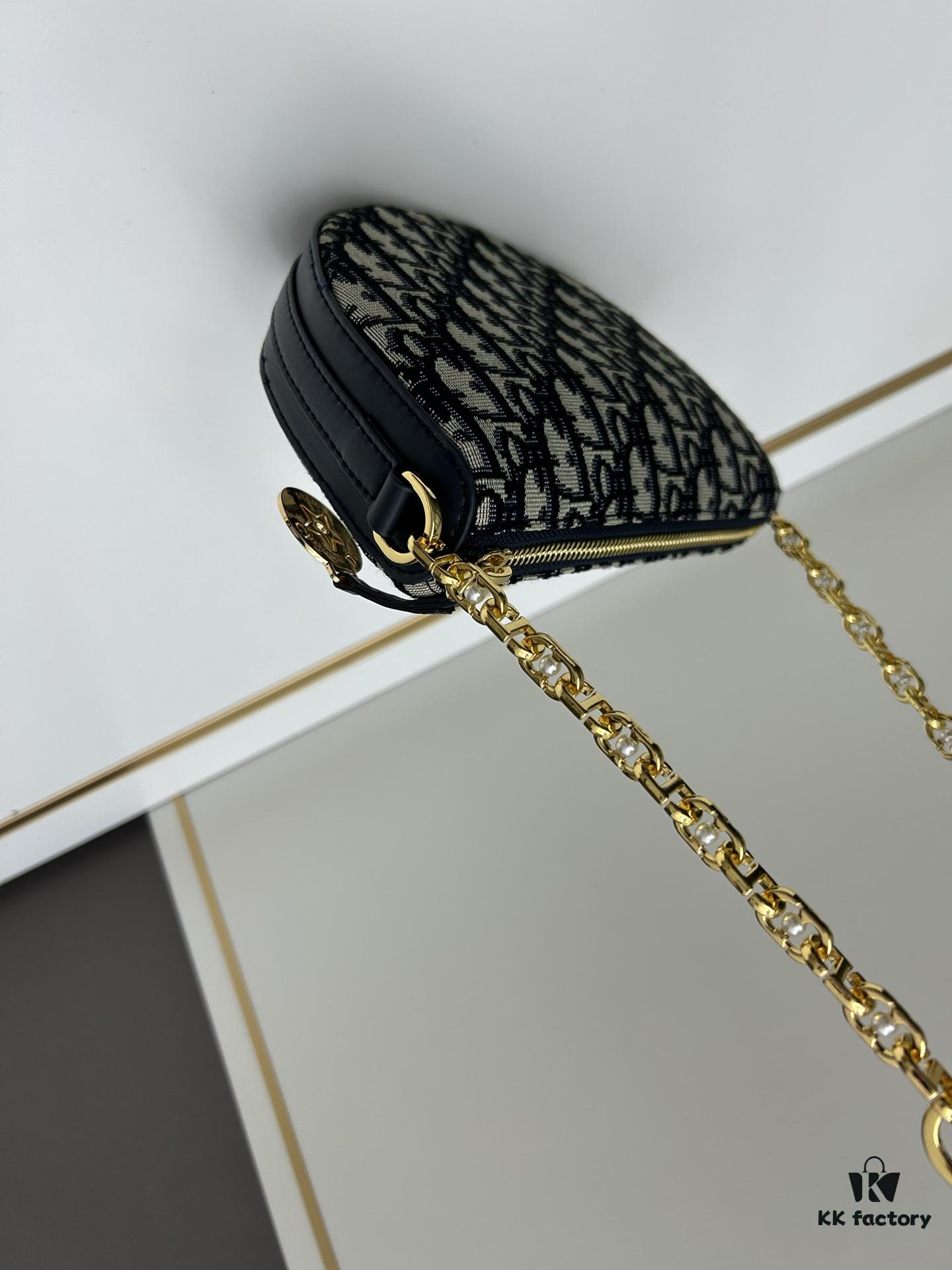 693099e56e68136f4d9aab30 Callisto Chain Handbag in Blue Oblique Print