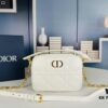 69309a8f6e68136f4d9aac7d Dior Caro Top Handle Camera Bag in Black Calfskin - Small Size, Spring/Summer 2024 Collection