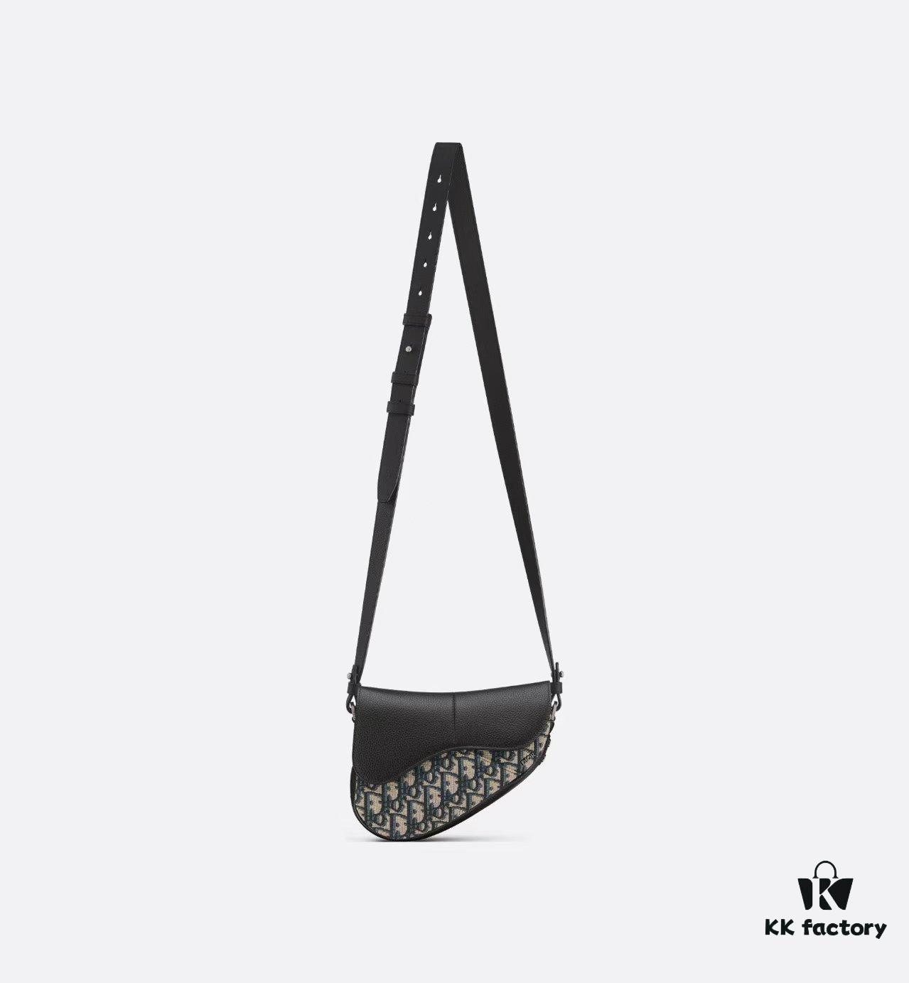 69309d046e68136f4d9ab143 This saddle bag reinterprets the classic design with a modern structure. Crafted from beige and black Oblique printed fabric, it features a signature black grained cowhide magnetic flap and a concealed zip closure. The interior includes a large compartment and slip pockets for daily essentials. The mini style comes with an adjustable, detachable leather shoulder strap, allowing for handheld, shoulder, or crossbody wear.