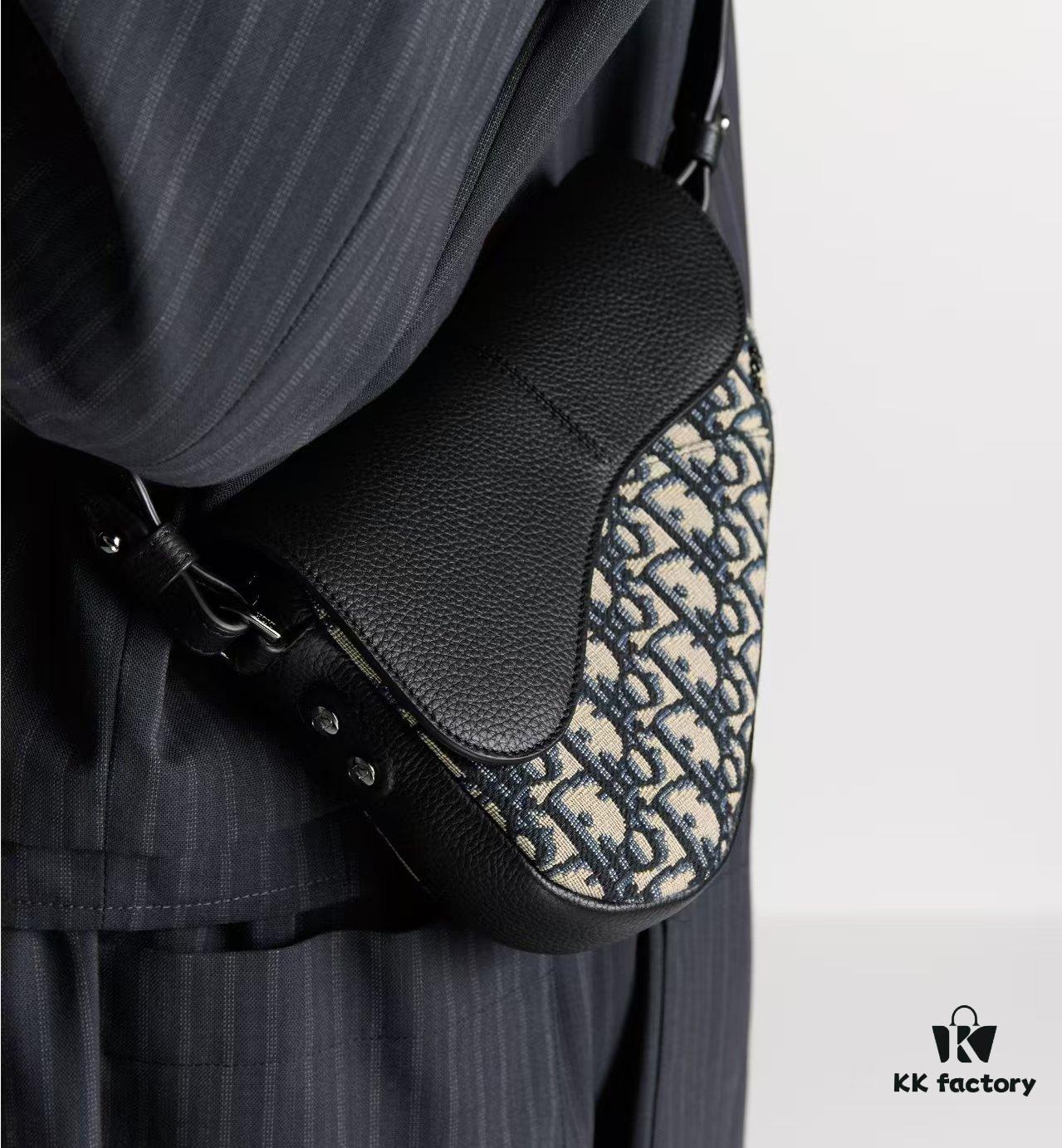 69309d056e68136f4d9ab148 This saddle bag reinterprets the classic design with a modern structure. Crafted from beige and black Oblique printed fabric, it features a signature black grained cowhide magnetic flap and a concealed zip closure. The interior includes a large compartment and slip pockets for daily essentials. The mini style comes with an adjustable, detachable leather shoulder strap, allowing for handheld, shoulder, or crossbody wear.