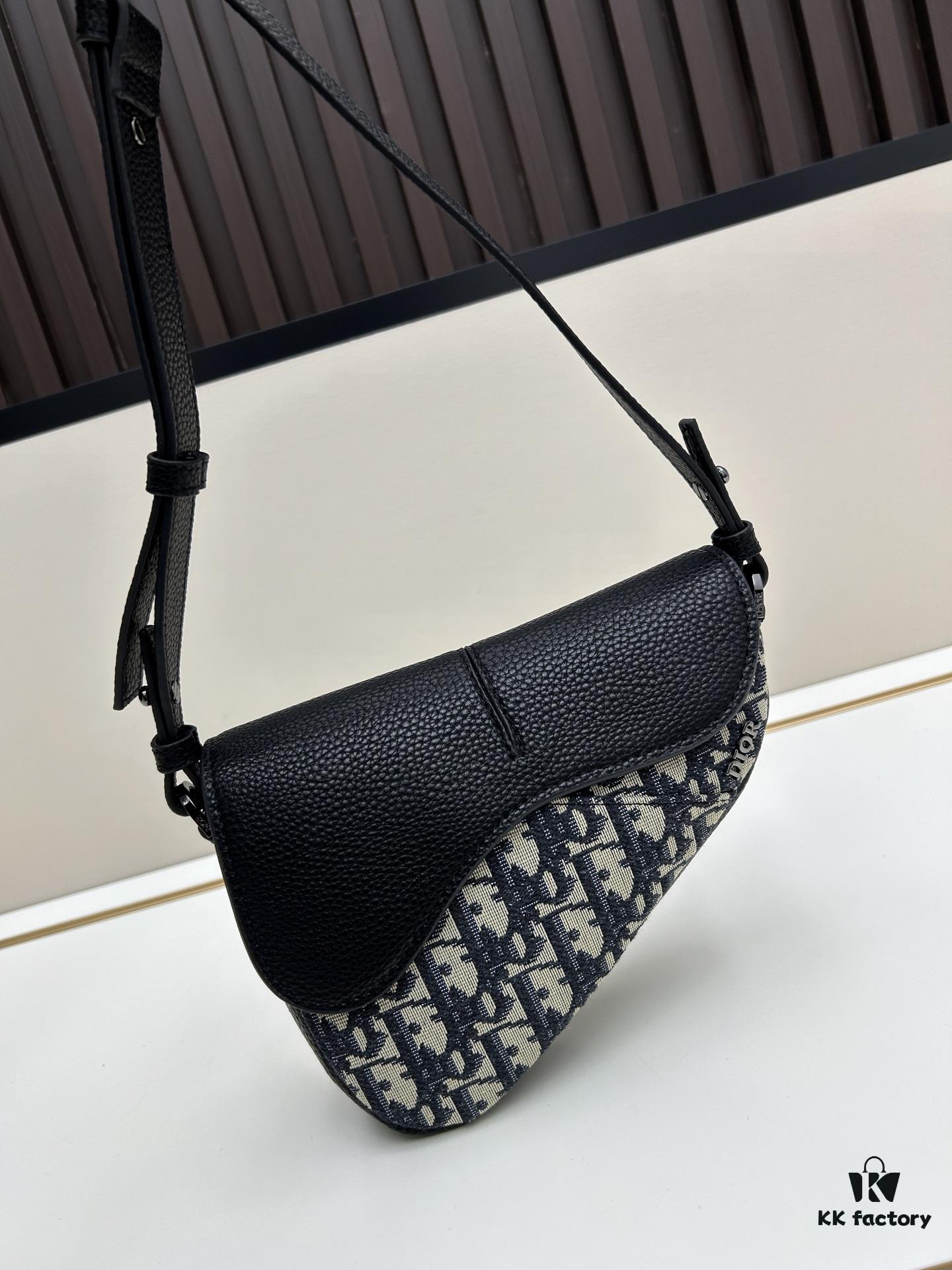 69309d0c6e68136f4d9ab153 This saddle bag reinterprets the classic design with a modern structure. Crafted from beige and black Oblique printed fabric, it features a signature black grained cowhide leather magnetic flap and a concealed zip closure. The interior includes a large compartment and slip pockets for daily essentials. The mini style comes with an adjustable, detachable leather shoulder strap, allowing versatile wear as a top handle, shoulder bag, or crossbody.