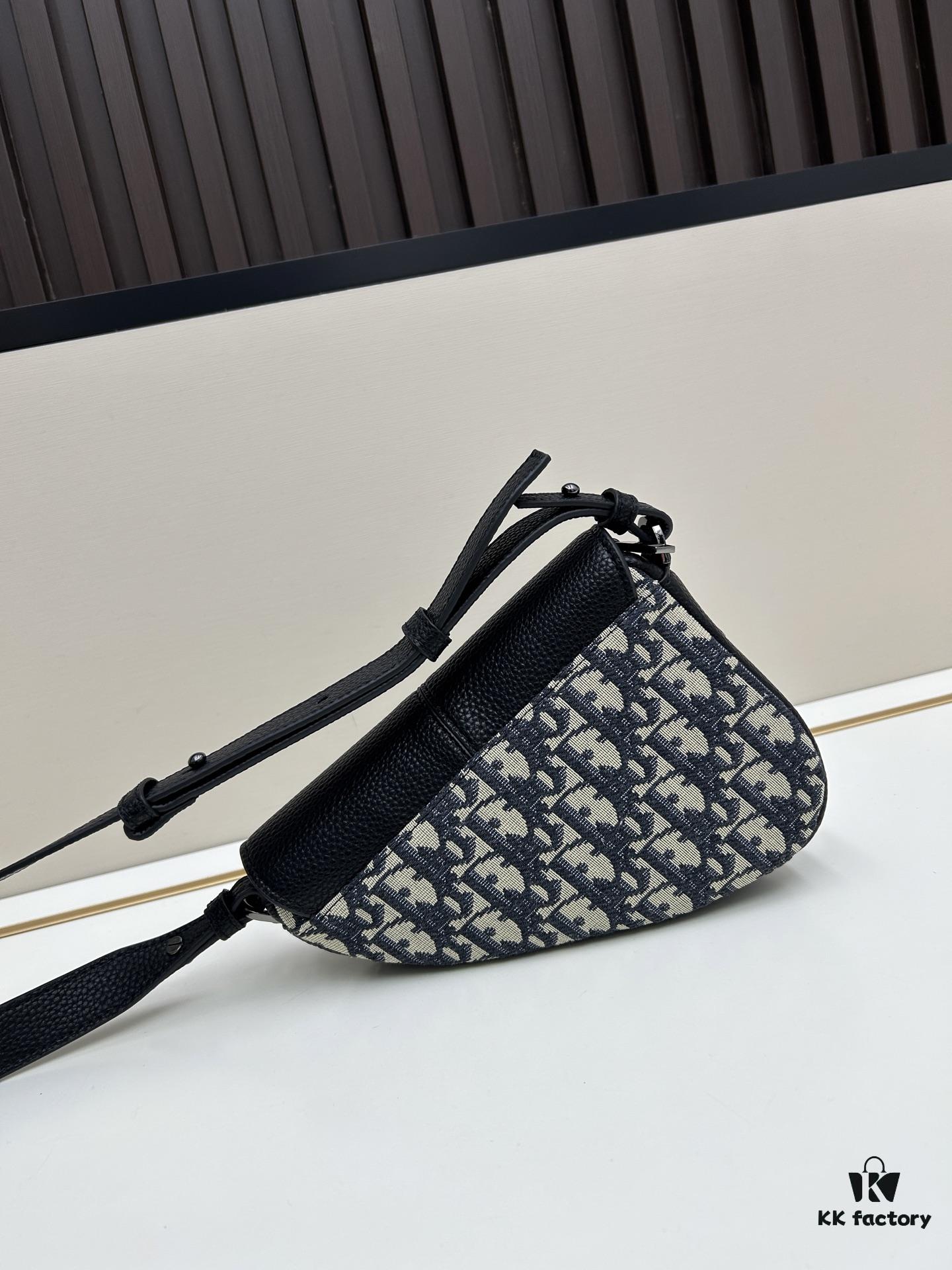 69309d0d6e68136f4d9ab155 This saddle bag reinterprets the classic design with a modern structure. Crafted from beige and black Oblique printed fabric, it features a signature black grained cowhide leather magnetic flap and a concealed zip closure. The interior includes a large compartment and slip pockets for daily essentials. The mini style comes with an adjustable, detachable leather shoulder strap, allowing versatile wear as a top handle, shoulder bag, or crossbody.