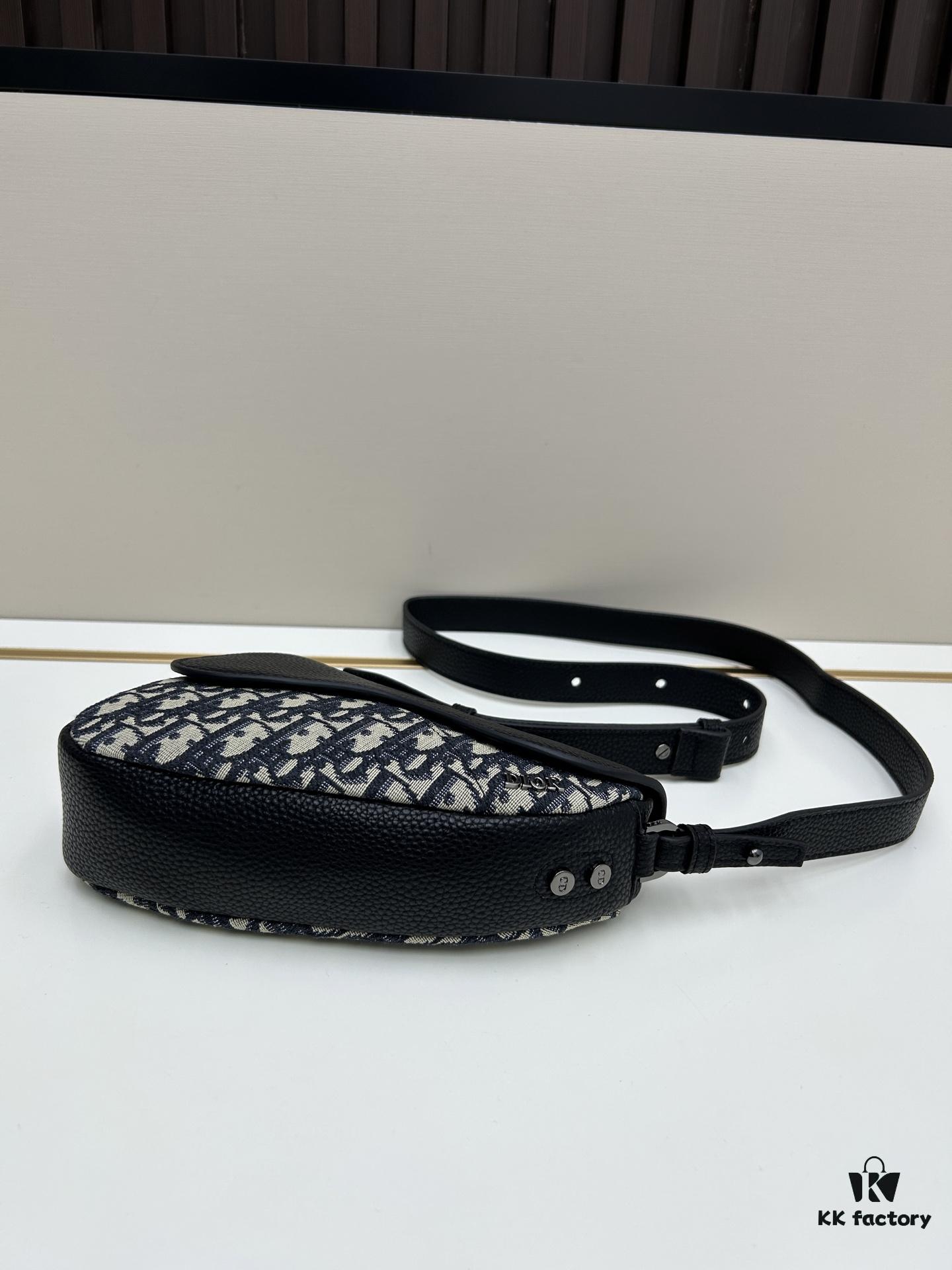 69309d0d6e68136f4d9ab156 This saddle bag reinterprets the classic design with a modern structure. Crafted from beige and black Oblique printed fabric, it features a signature black grained cowhide leather magnetic flap and a concealed zip closure. The interior includes a large compartment and slip pockets for daily essentials. The mini style comes with an adjustable, detachable leather shoulder strap, allowing versatile wear as a top handle, shoulder bag, or crossbody.